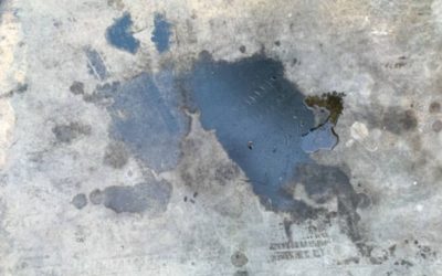 How to Remove Paint, Rust Stains, Adhesives & Oil from Concrete